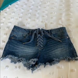 Fringed cross tie up shorts